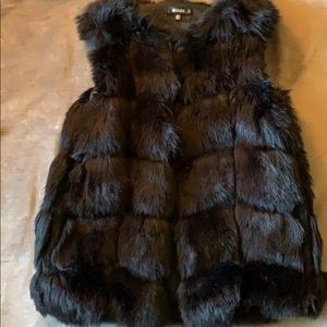 Black faux fur vest